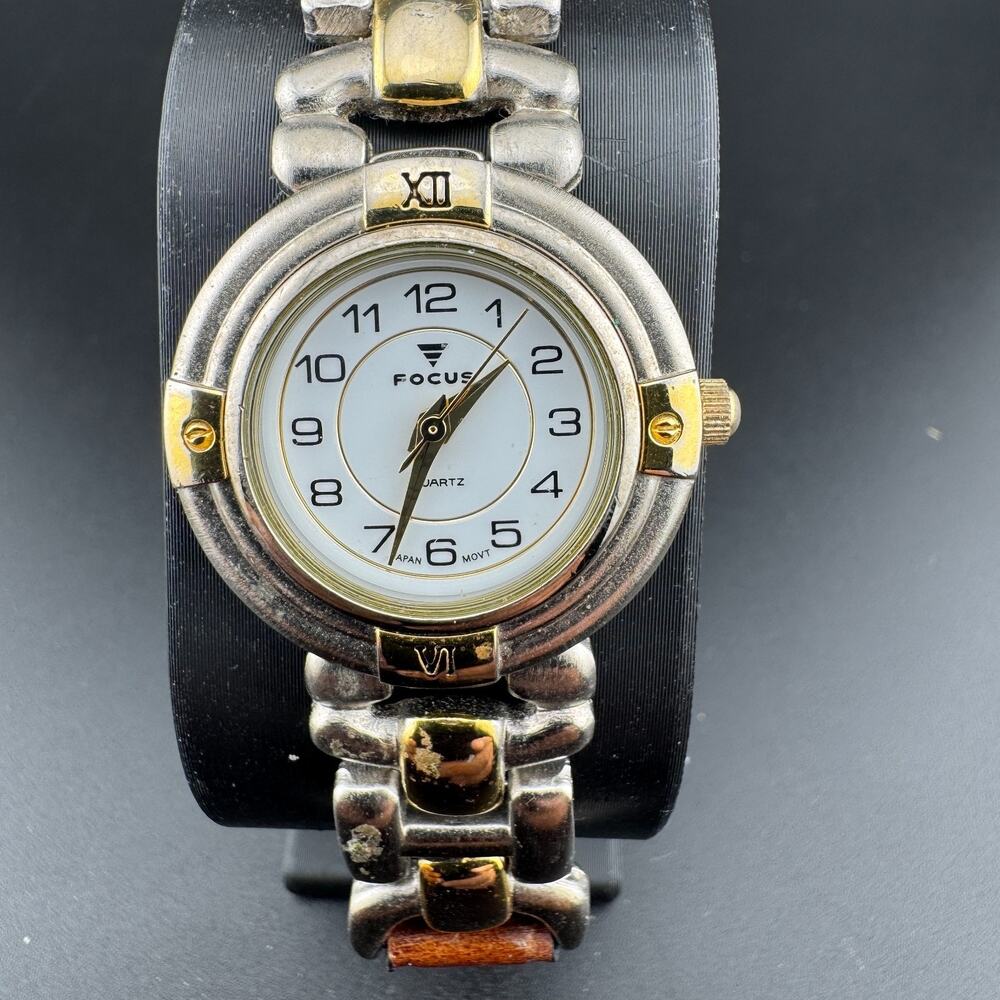 Focus Ladies Watch Two Tone Roman Numeral Bezel Leather Band